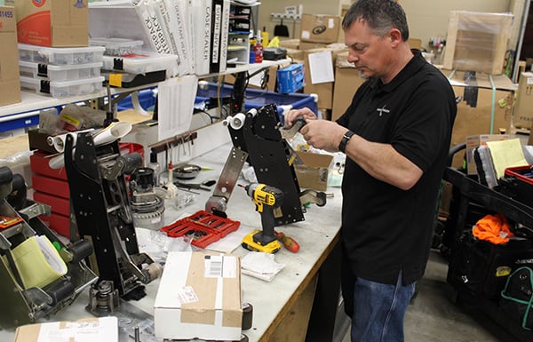 Service tech working on tape head